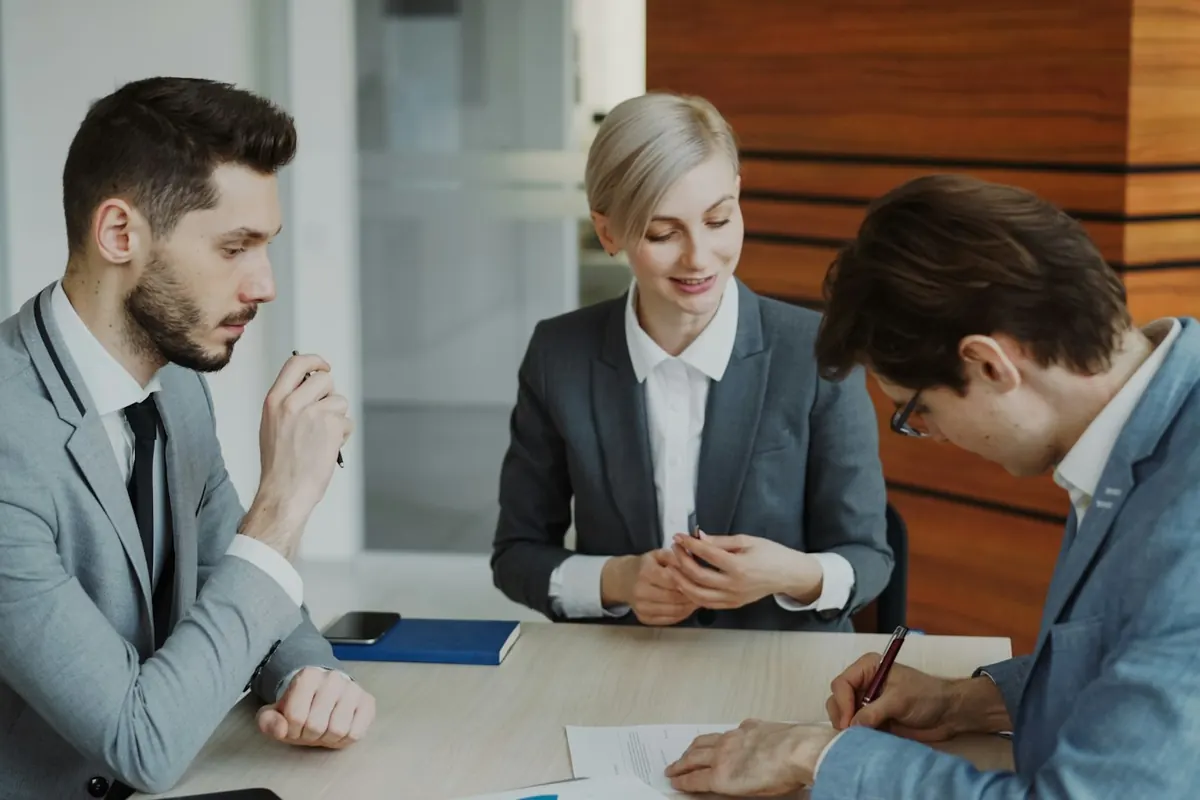 CDC Lease specialists reviewing lease terms with a business client